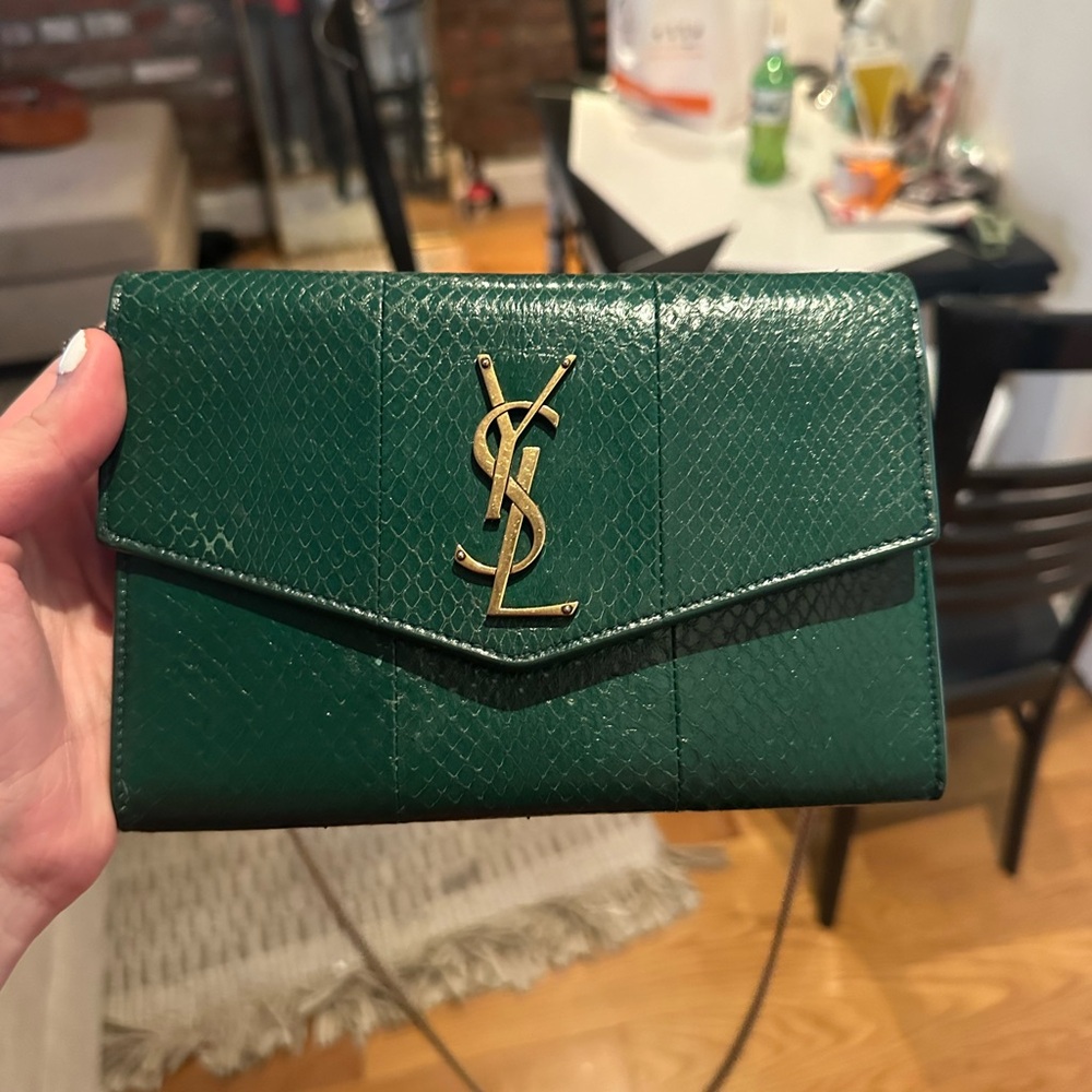 Authentic YSL wallet with chain strap. Normally goes for $1490.